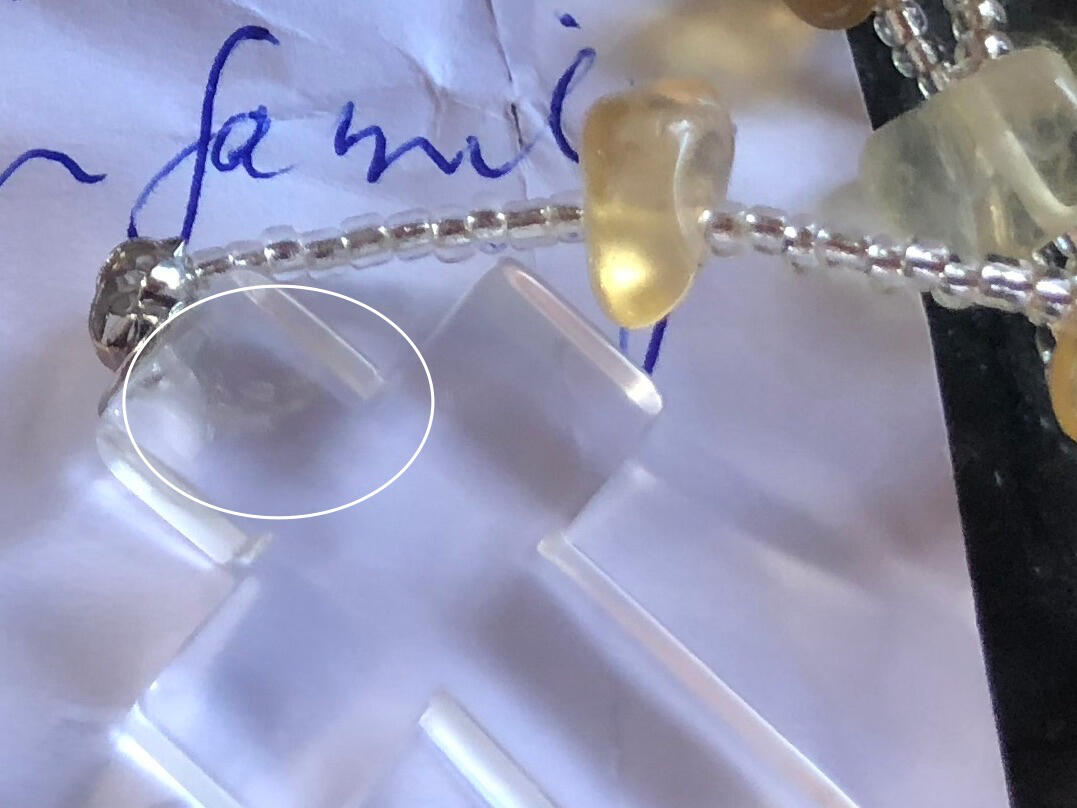 Materialisation of Jesus on the cross of crystal rosary beads by Paul McCarthy. iluminar.au
